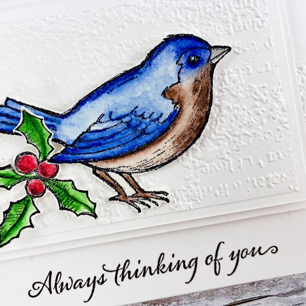 this-luxury-handmade-christmas-card-features-blue-bird-on-top-of-embossed-cardstock